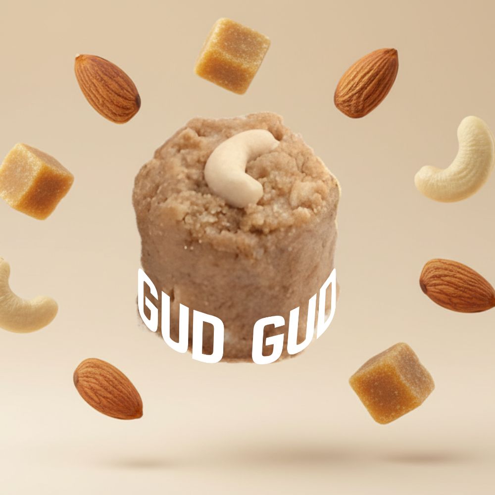 Adadiya with 'GUD GUD' branding surrounded by almonds and cashews on a beige background