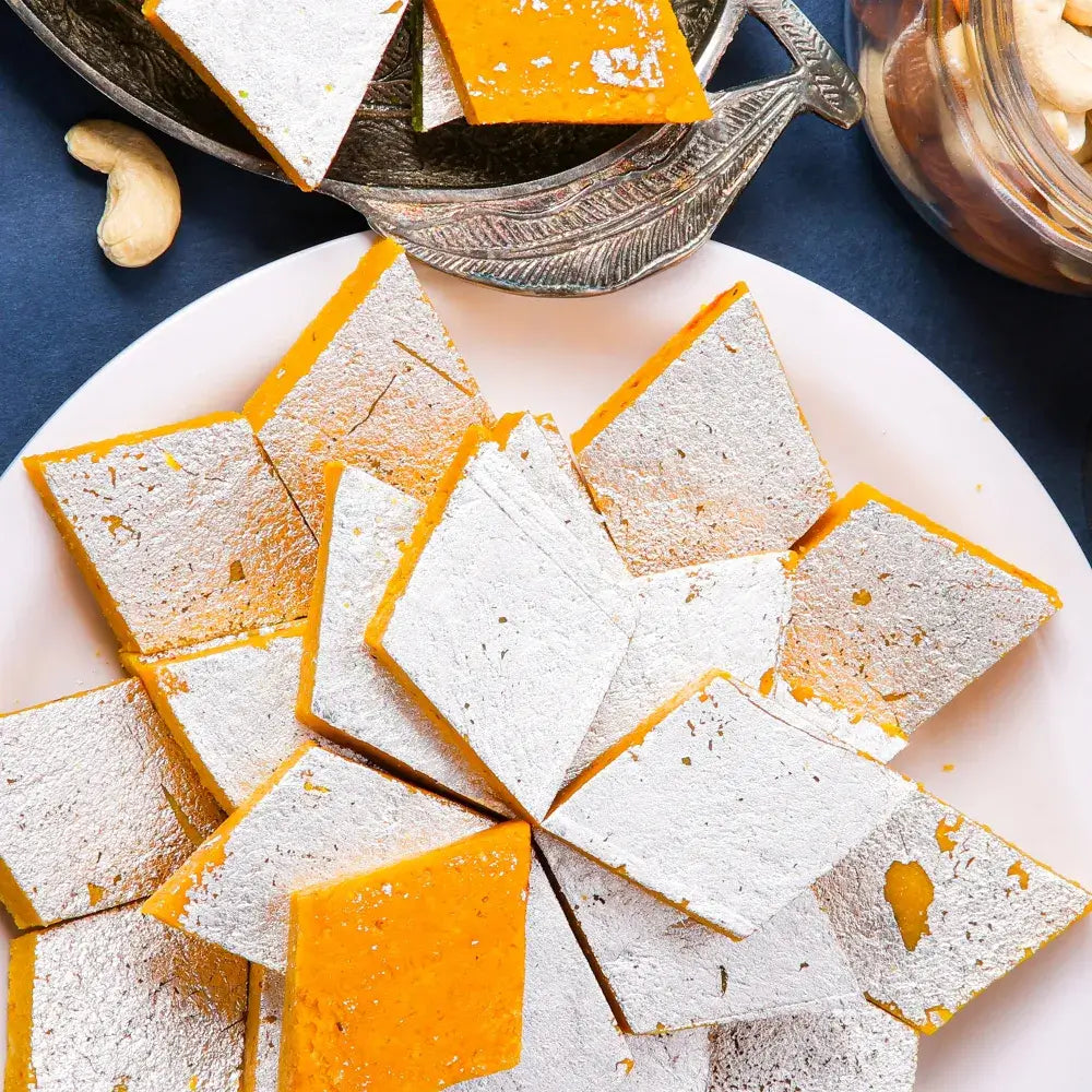 Premium Kesar Katli from Mithdi Sweets Surat, the best sweet shop in India for traditional Indian sweets and bulk sweets order India.