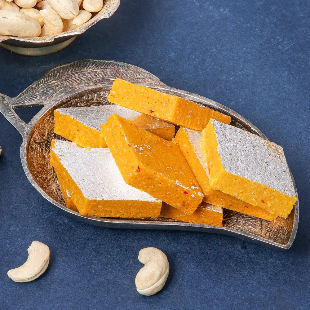 Authentic Kesar Katli, a signature Gujarati mithai in Surat, perfect for diwali sweets online and sweets for weddings.